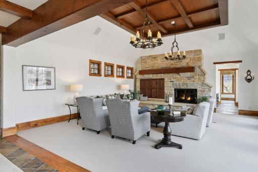Beautiful stone surrounding the fireplace and freshly painted walls
