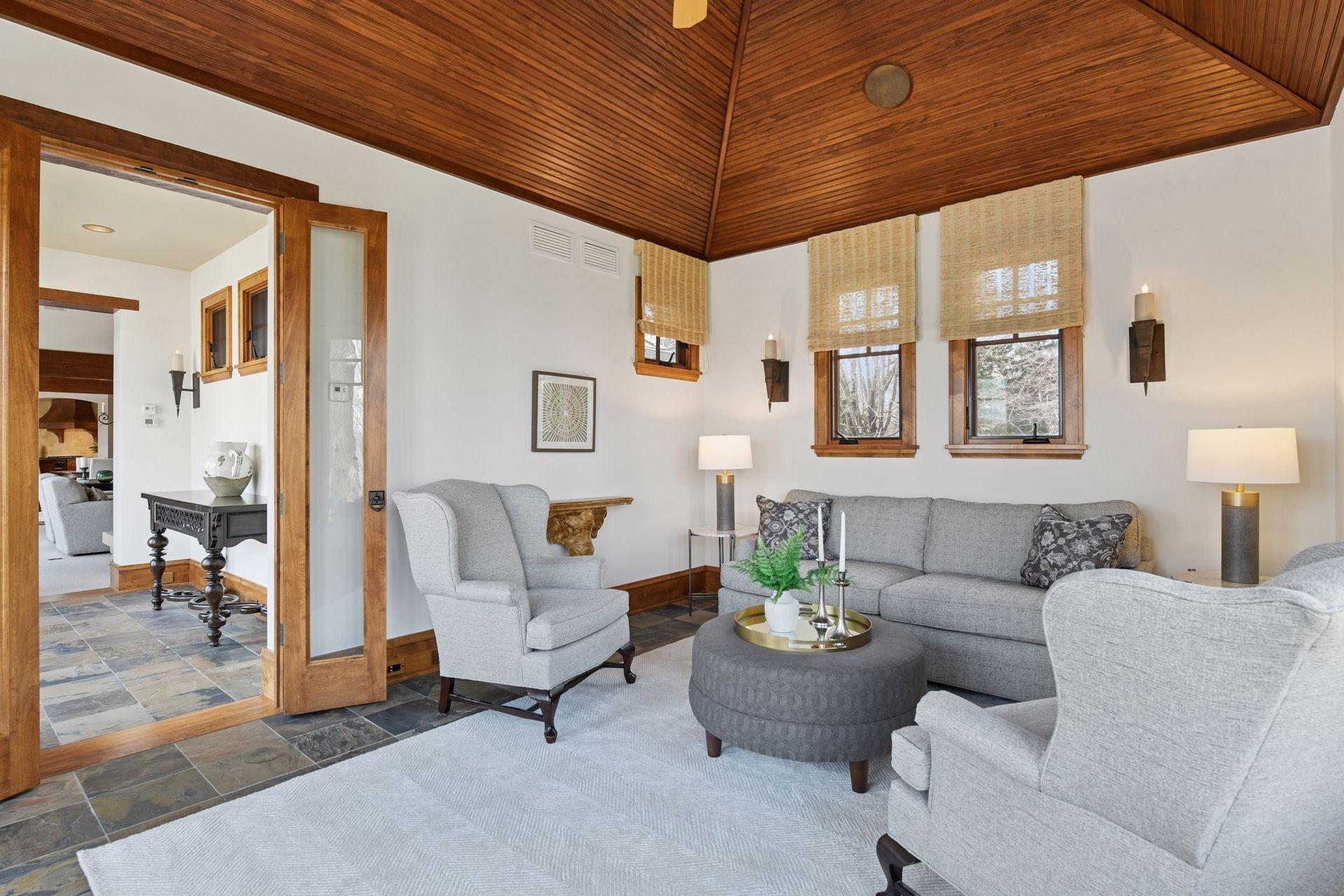 Vaulted sunroom tucked off the living room
