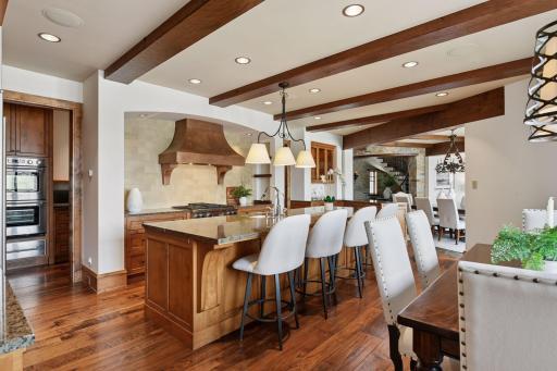 Large center island is ideal for meal prep, quick bite to eat, and laying out a buffet when entertaining