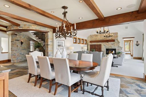Formal dining area with wood beamed ceilings
