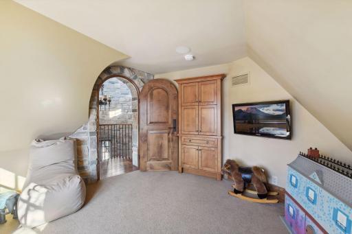 Upper level bonus room above the foyer