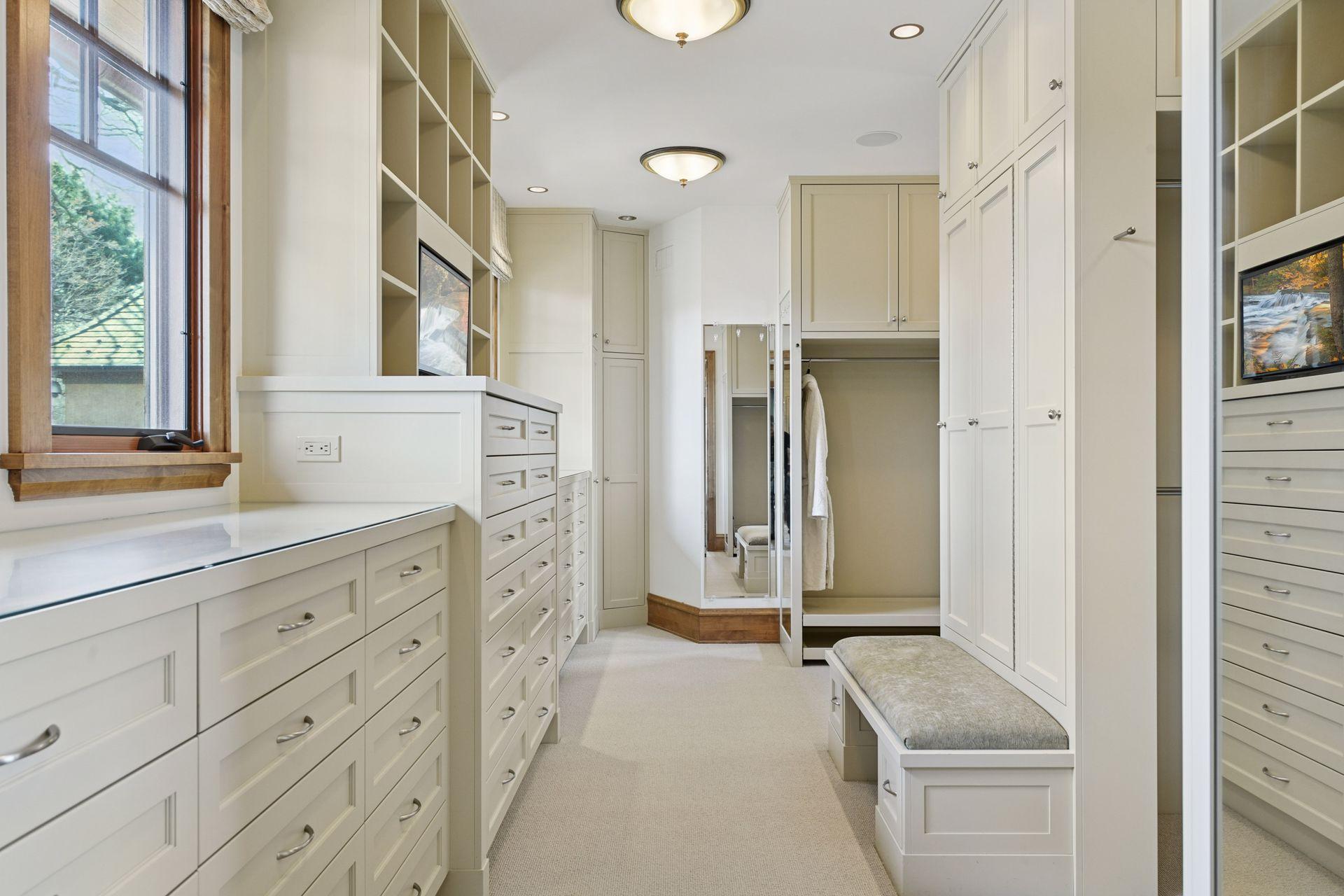 Amazing closet space with built-in storage and organizational components