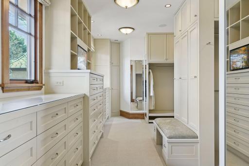 Amazing closet space with built-in storage and organizational components
