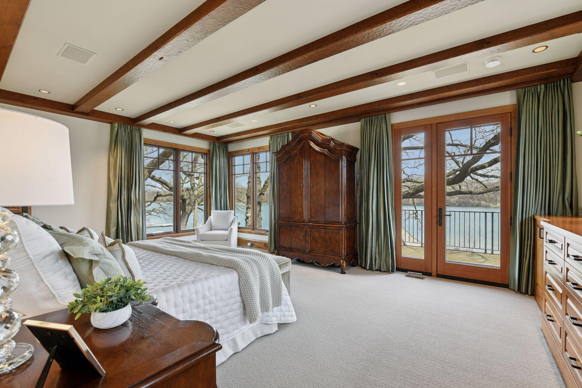 Wood-beamed ceilings, beautiful natural light, and sunrise views over the lake