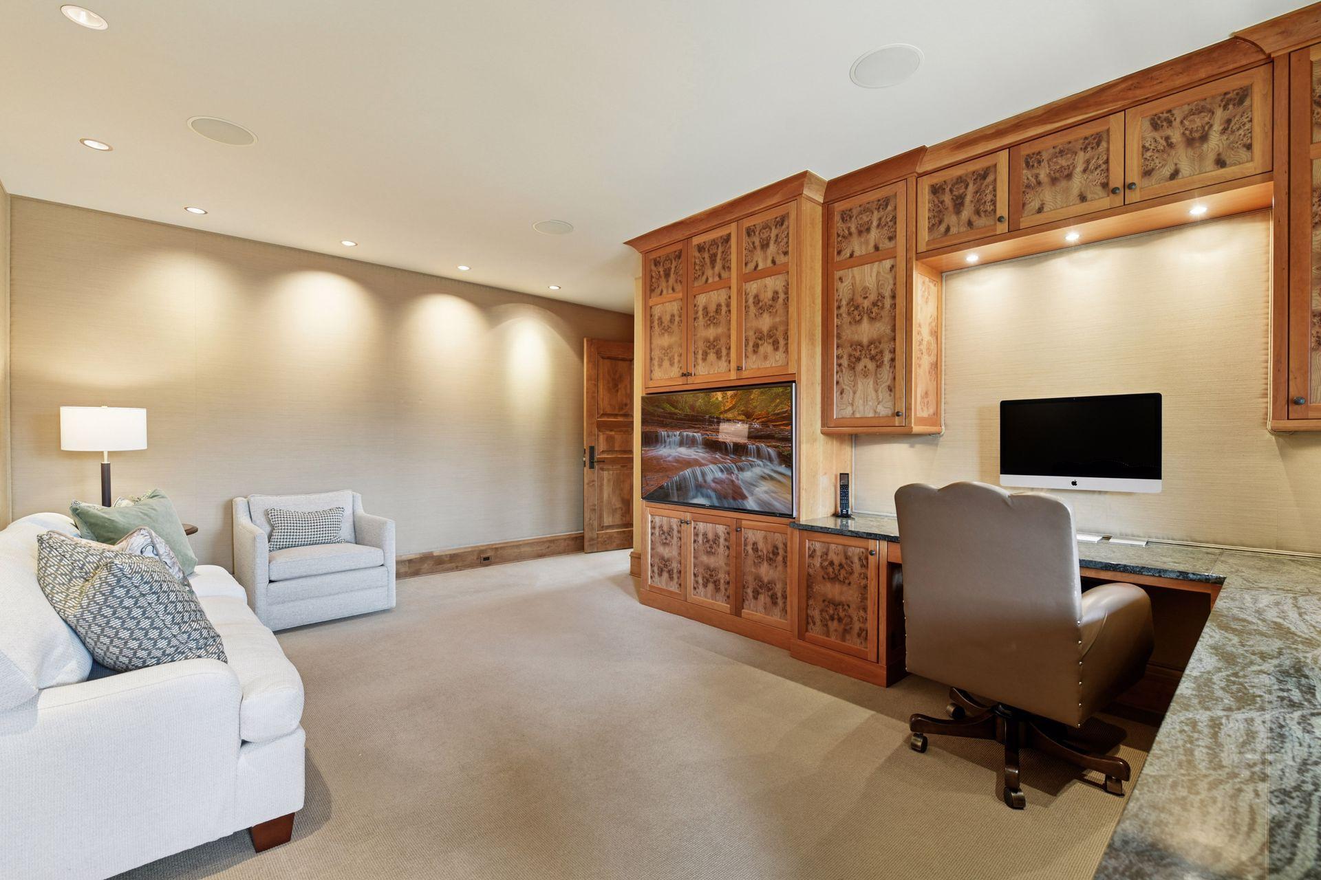 Main floor office with built-ins and desk