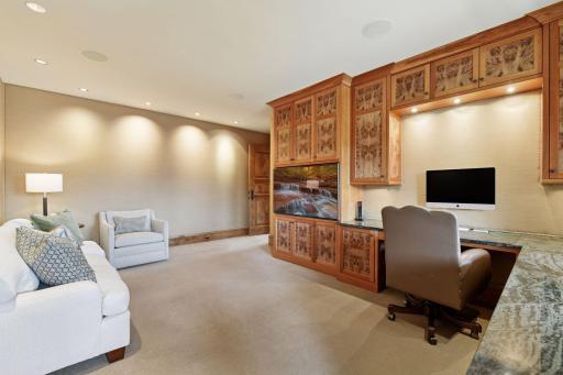 Main floor office with built-ins and desk