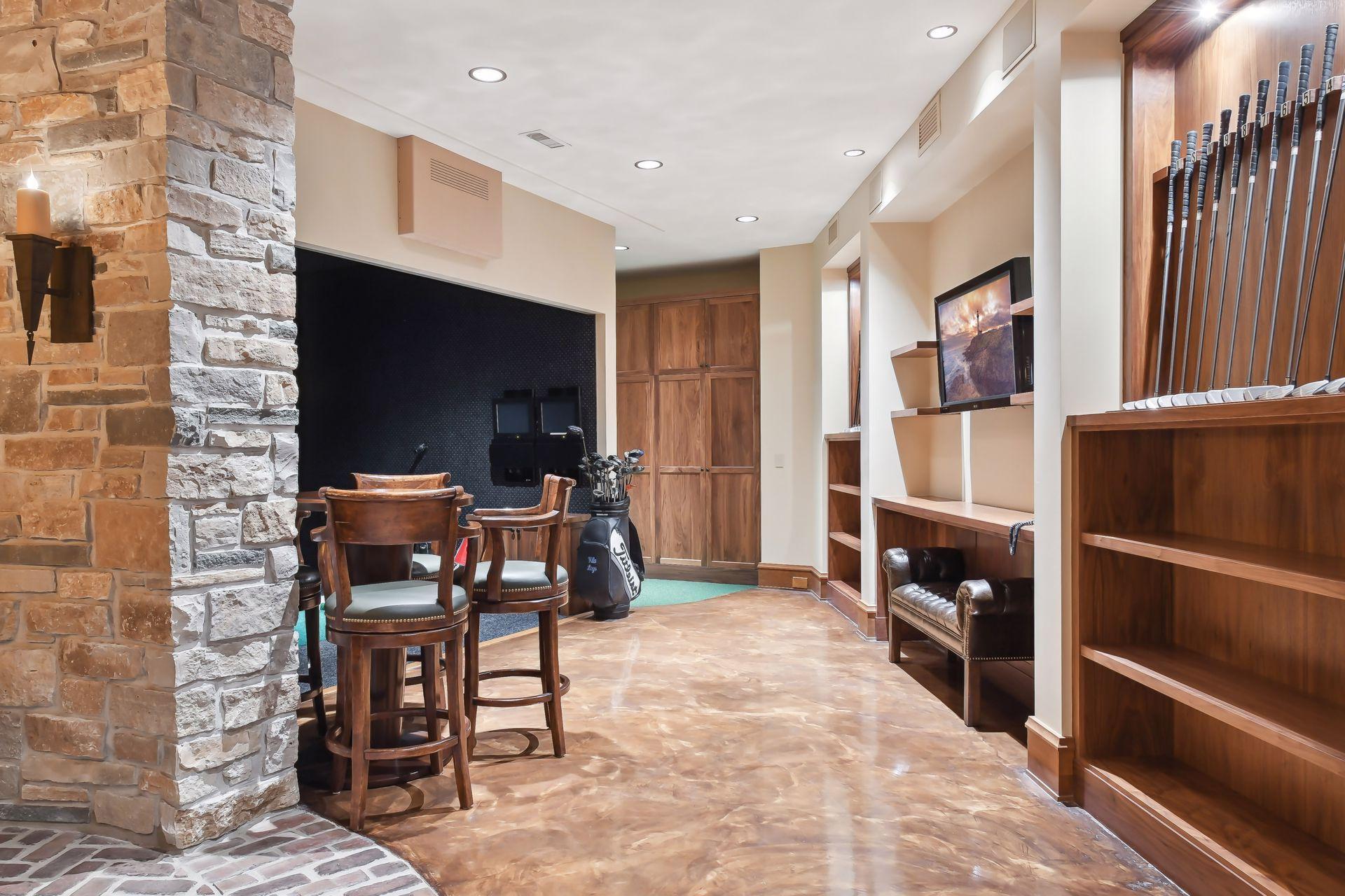 Bar area leads to the golf simulator and putting area