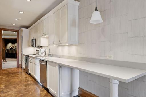 A breakfast bar makes it easy to grab a quick bite before heading upstairs to start the day