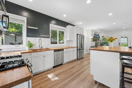 Whether cooking or entertaining, you'll appreciate the seamless connection between the kitchen and surrounding living spaces