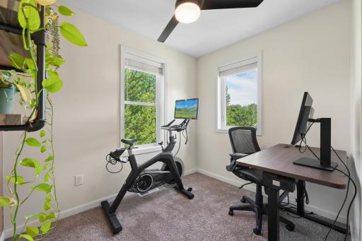 This versatile bedroom is ideal as a home office, fitness room, or guest space
