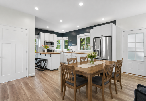 Relocate the island and utilize a dining table in this open area