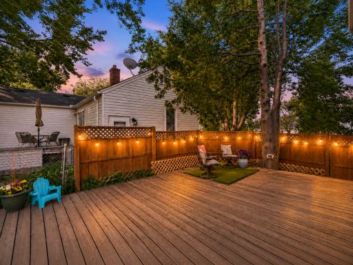 A lovely evening entertaining area with plenty of room for multiple seating areas