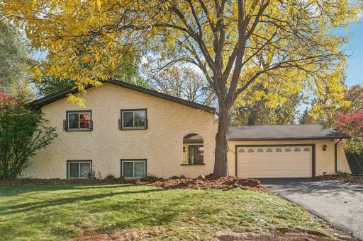 Photo for 3017 74th Avenue N, Minneapolis, MN 55444 - listing #6813091 Freshly sealed driveway and heated 2-car garage.