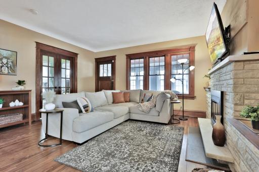 Tons of windows make this home light and bright! Look at that woodwork!!