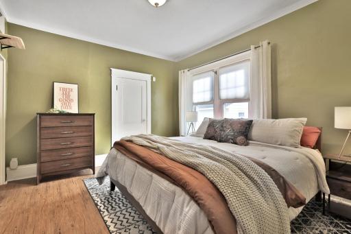 Primary bedroom with walk in closet, attic access and two more closets.