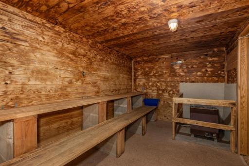 The sauna is located in the pool building just beyond the locker rooms.