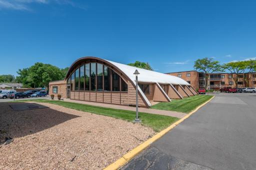 Seahorse features and indoor pool building with locker rooms, exercise equipment and sauna. You can rent the party room for a very small fee.