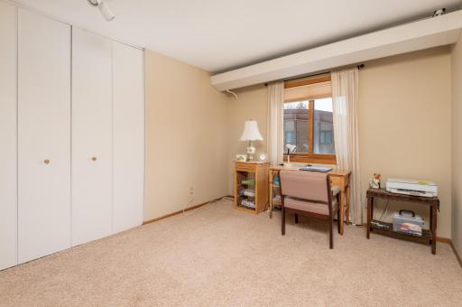 Second bedroom with a large closet for storage. Turn this into a home office and look out the window as you work.