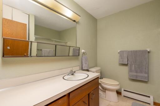 The bathroom has a large vanity that allows you to set out what you need for your morning and bedtime routine.