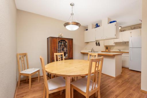 There is room for a smaller table and hutch in the informal dining room when you invite guests over for dinner.