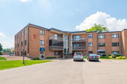Entrance to building five. There is ample parking available for guests, even during the summer months. Very close to the pool building too.