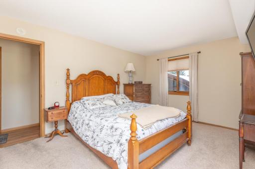 There are two spacious bedrooms in the condo and this one serves as the primary bedroom.