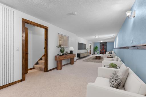 Lower level family room virtually staged