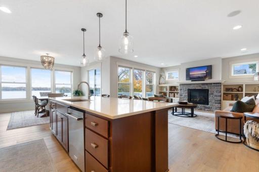 22. Gourmet Kitchen_ Quartz counters, stainless-steel appliances, and an expansive walk-in pantry make this kitchen both functional and beautiful.jpg