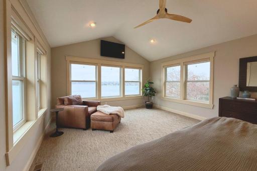 46. Primary Suite with panoramic lake views.jpg