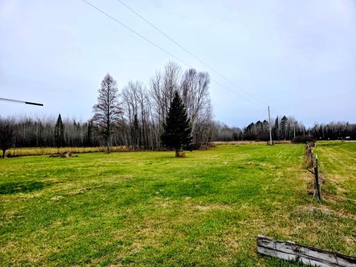 Yard to the right of building