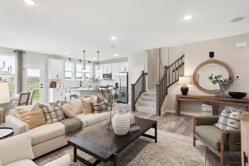 Photo for 9272 Larimar Trail, Eden Prairie, MN 55347 - listing #6814829 The Duncan offers a wide-open main level floorplan that allows you flexibility and comfort in any layout you choose for your new home. Photo of model home.