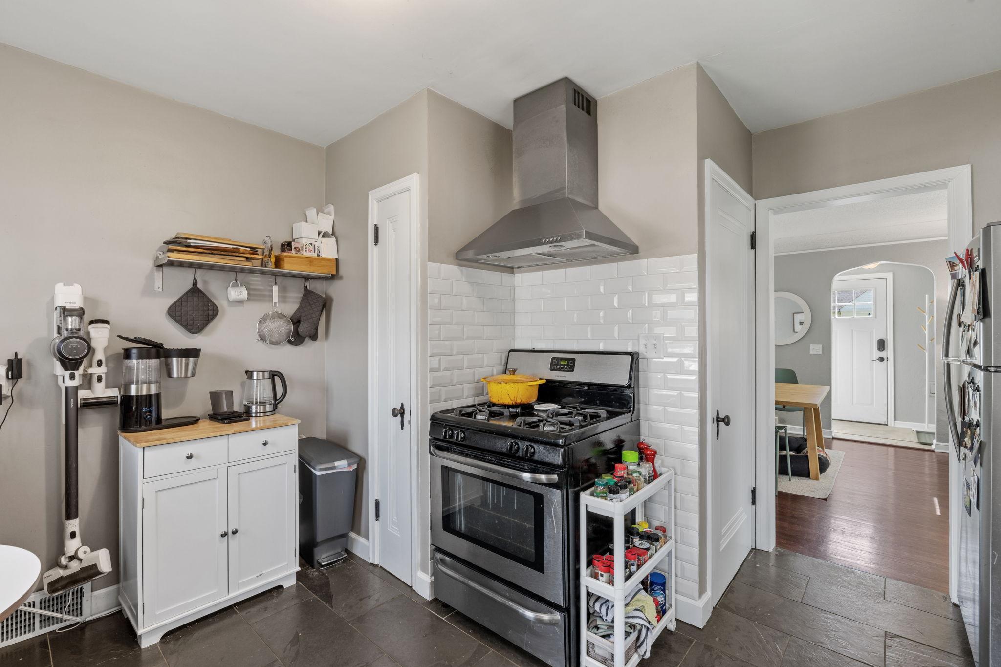 Kitchen features a true hood vent if you like serious cooking!