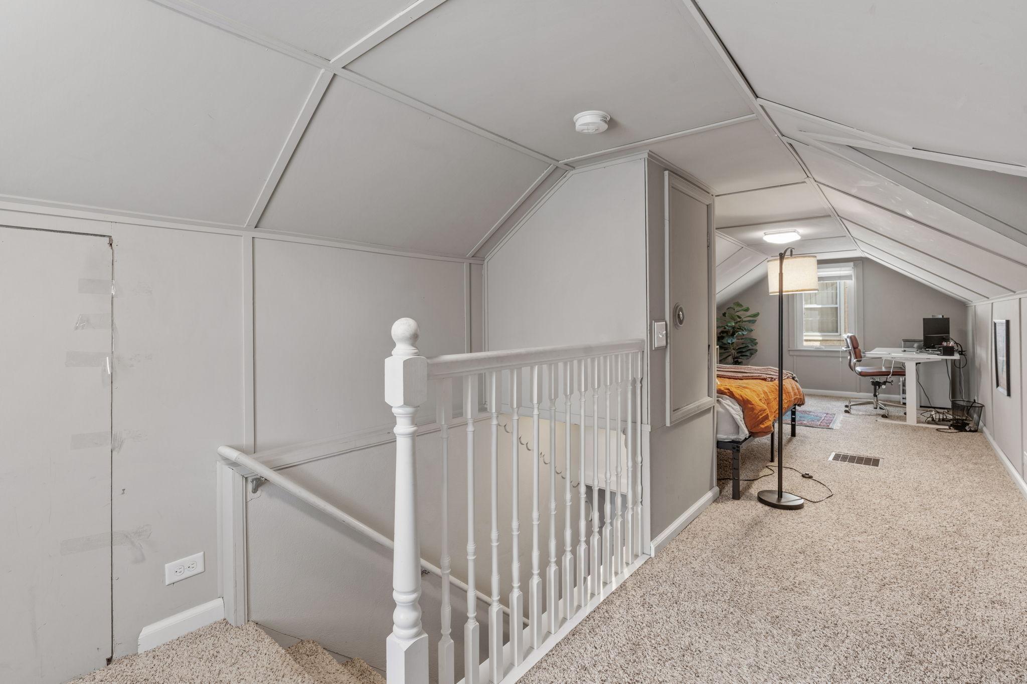 Upper level owner's suite with lots of space for an office!