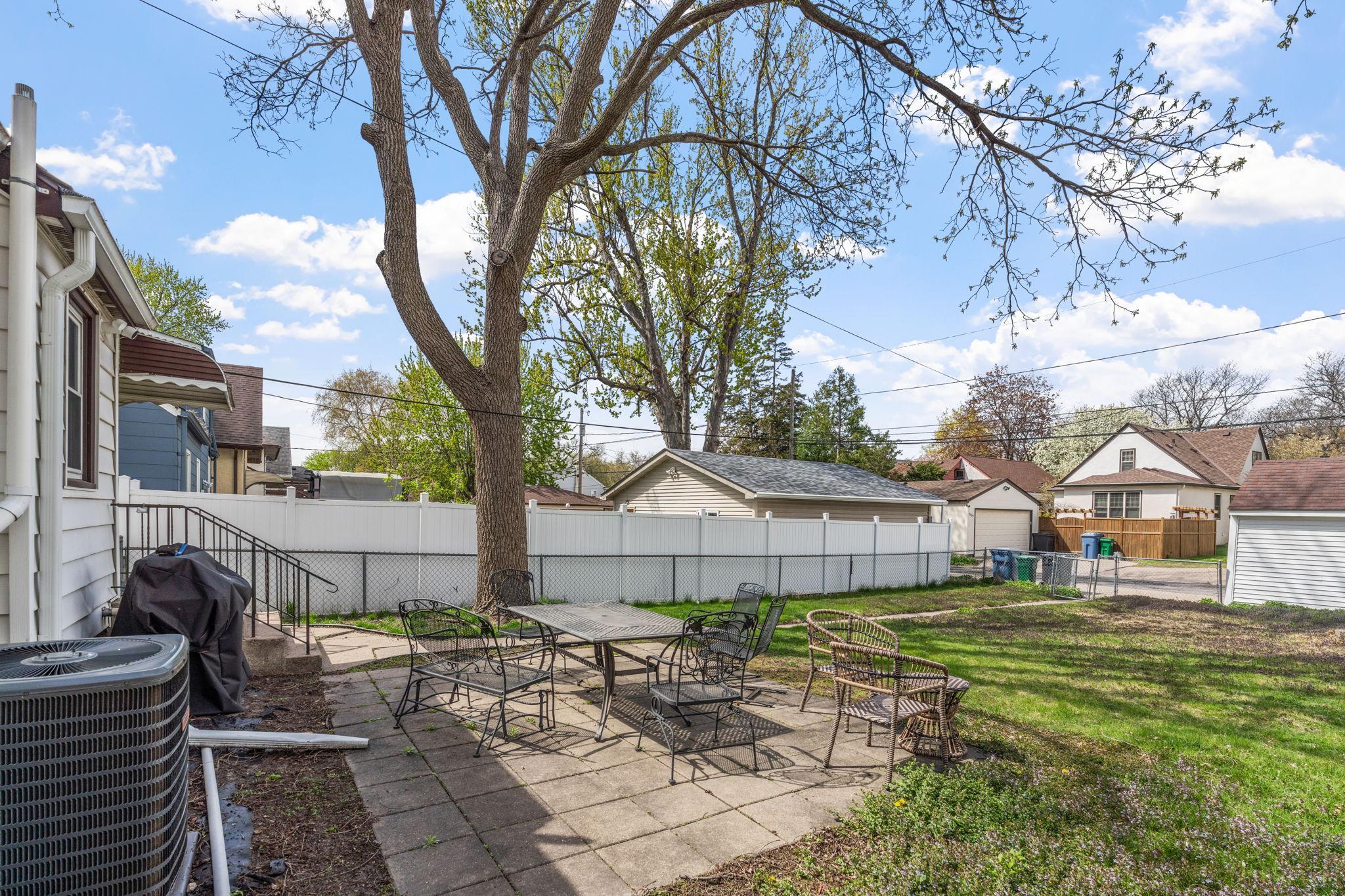 Lovely large patio overlooking fenced back yard