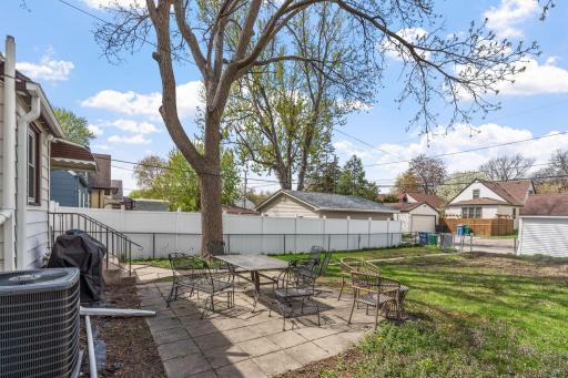 Lovely large patio overlooking fenced back yard