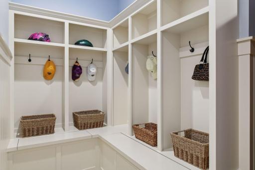 Mudroom with built ins and large walk in closet