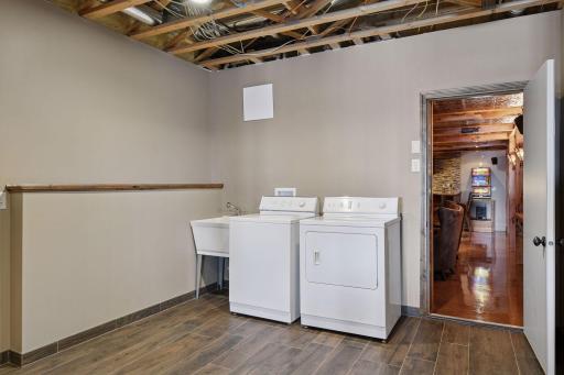 Lower level laundry with exterior access. Perfect for landing after a day on the lake