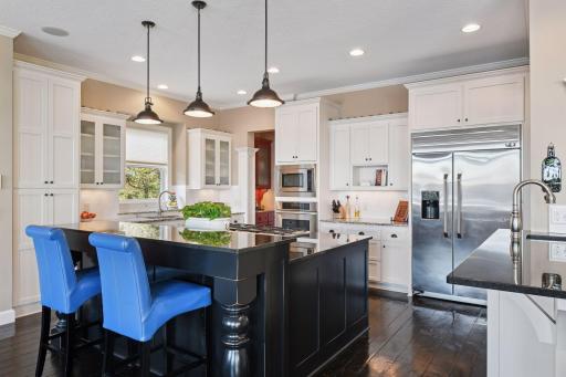 Enormous kitchen island with 6 burner gas stove top