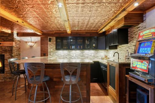 Large wet bar with refrigerator and dishwasher drawers