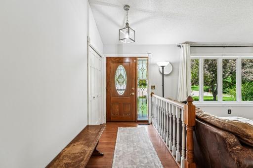 Front Entry with closet and new lighting fixtures