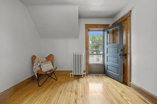 3121 Bloomington Ave Bedroom 3 deck door.jpg