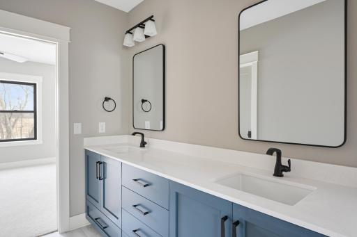 Lower Level Jack-&-Jill Bath - Images shown are from previous model and representative of design, layout and finishes