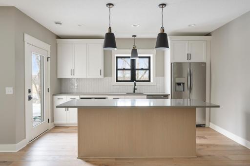 Lower Level Bar Area - Images shown are from previous model and representative of design, layout and finishes