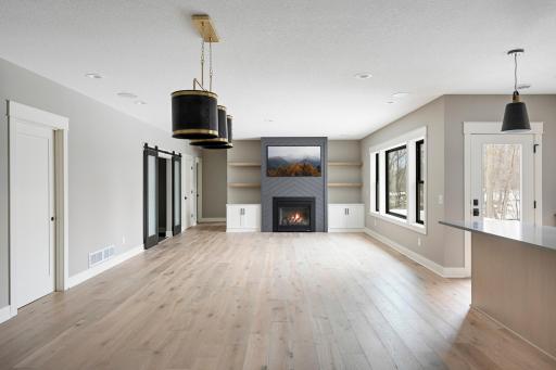 Lower Level Family Room -Images shown are from previous model and representative of design, layout and finishes