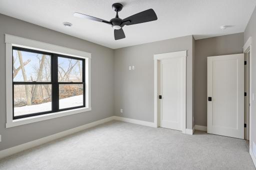 Lower Level Bedroom - Images shown are from previous model and representative of design, layout and finishes