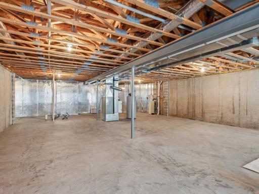 So much potential with this unfinished lower level!