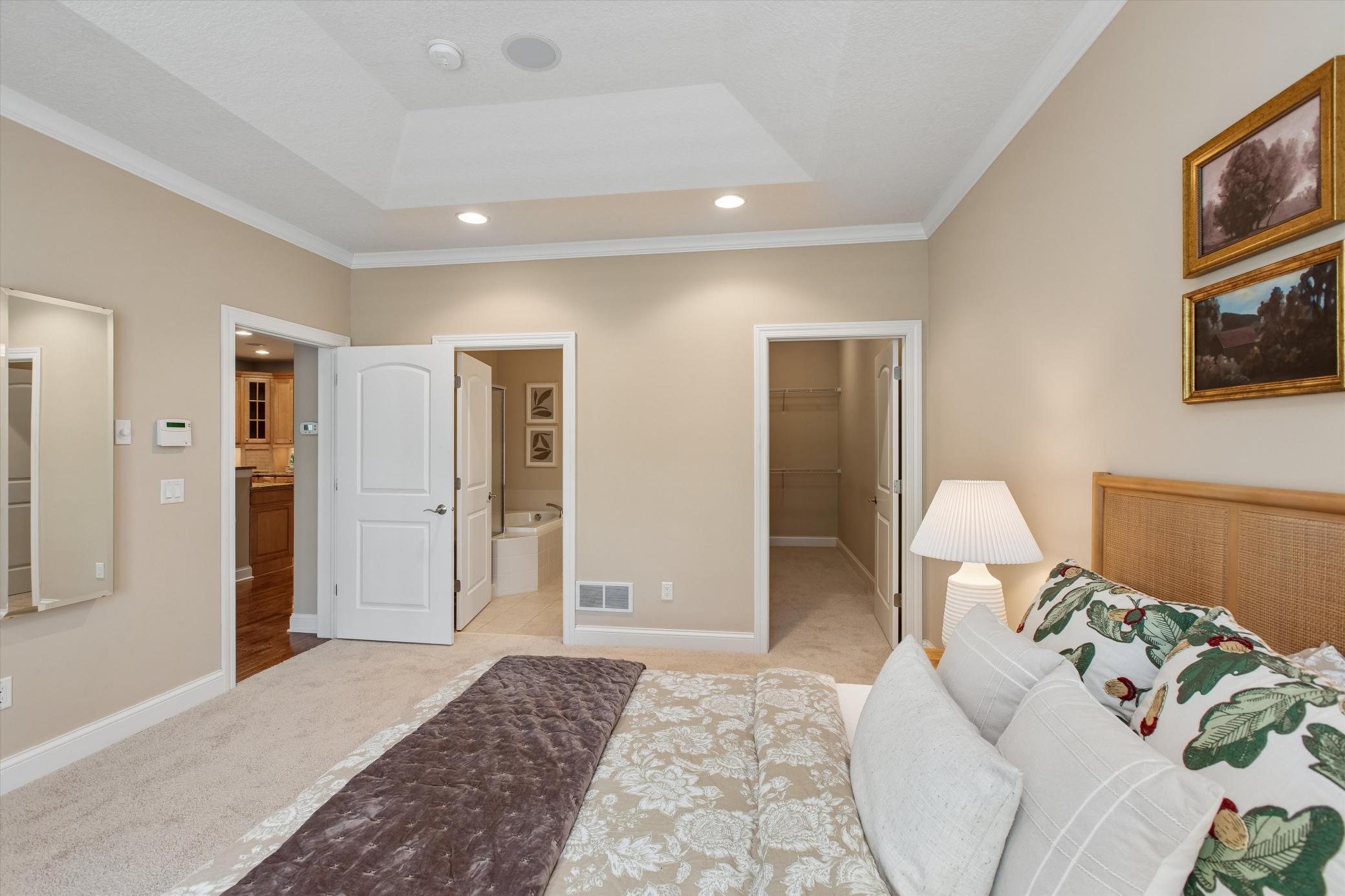 Primary bedroom with walk in closet and en suite