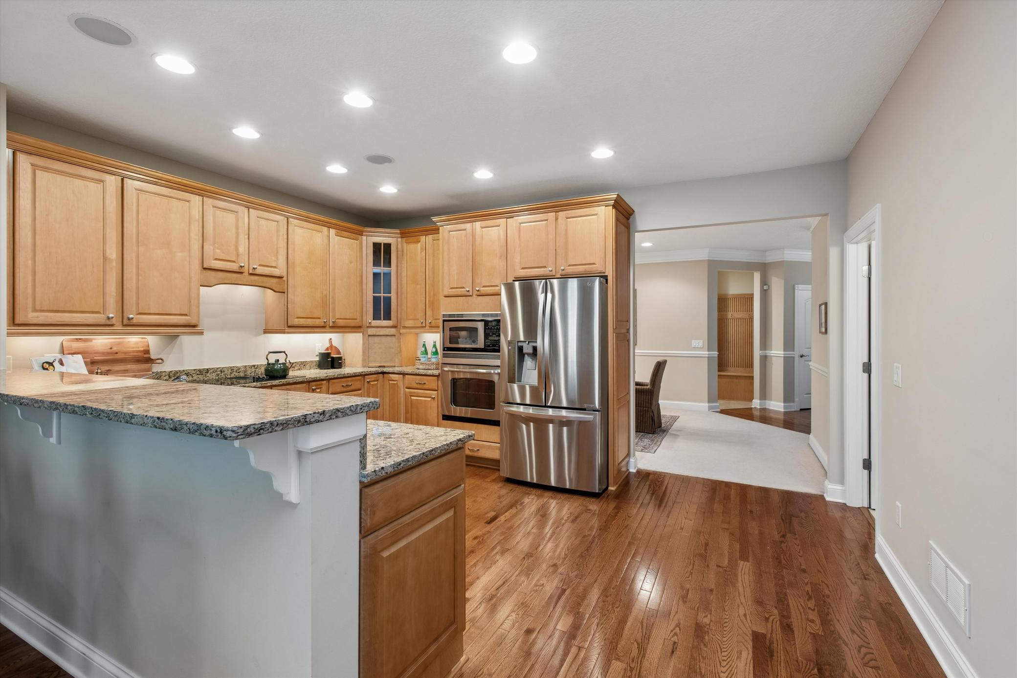 Notice dining room tucked behind kitchen