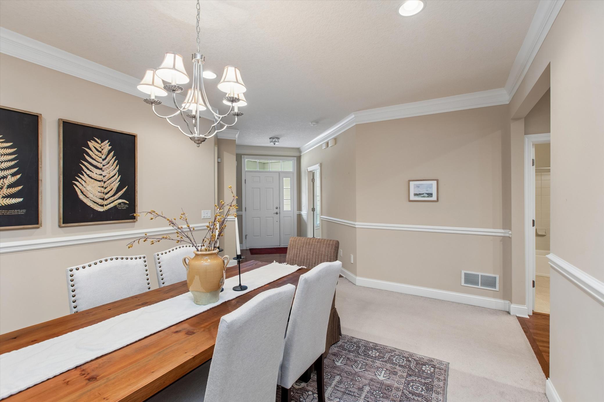 Formal dining room has separation from rest of main floor open floor plan