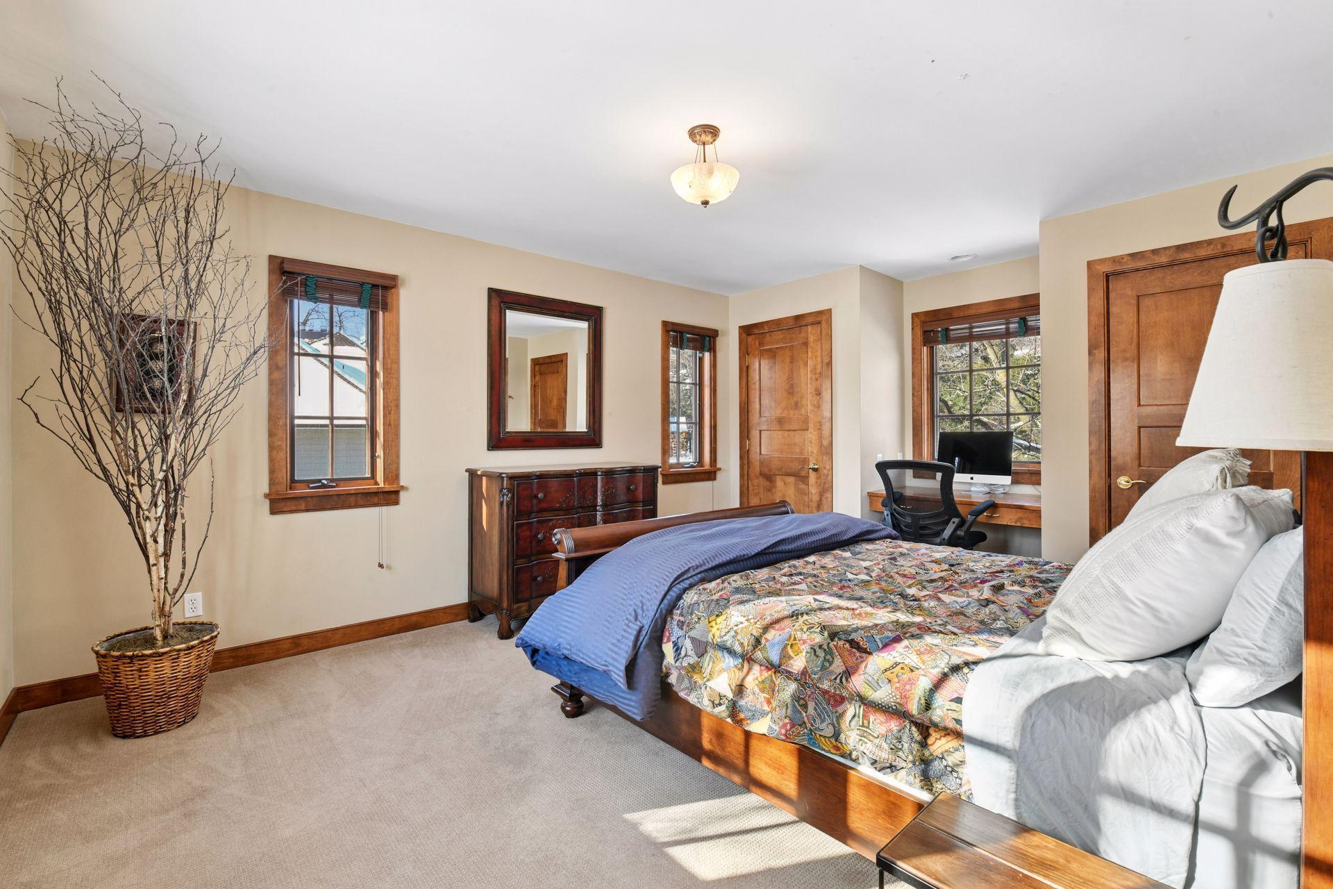 Multiple exposure, large, and also another bedroom with workspace